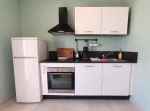 Kuchyň nebo kuchyňský kout v ubytování ColorMix 3 étoiles - 95m2 Plein Centre - Ensoleillé Climatisé
