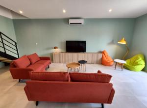 Posezení v ubytování ColorMix 3 étoiles - 95m2 Plein Centre - Ensoleillé Climatisé