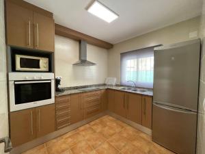Kuchyň nebo kuchyňský kout v ubytování VACACIONES CHALET PEÑISCOLA 8-B Alquiler