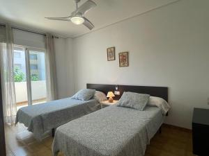 Postel nebo postele na pokoji v ubytování VACACIONES CHALET PEÑISCOLA 8-B Alquiler
