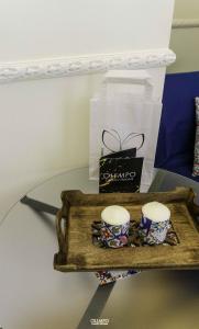 Příslušenství pro přípravu čaje a kávy v ubytování Olimpo Room