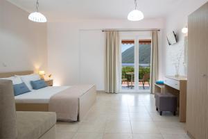 Postel nebo postele na pokoji v ubytování Menes Hotel