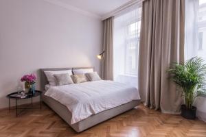 Posteľ alebo postele v izbe v ubytovaní New design APT - central location Wenceslas Square