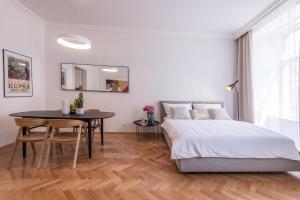 Posteľ alebo postele v izbe v ubytovaní New design APT - central location Wenceslas Square