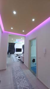 TV a/nebo společenská místnost v ubytování Velipoja Grand Europa Resort - appartement luxe privé