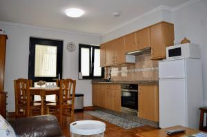 Kuchyň nebo kuchyňský kout v ubytování Apartamento Linde