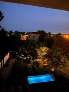 Bazén v ubytování B&B RIO GRANDE nebo v jeho okolí