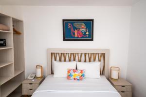 Cama ou camas em um quarto em Atoq Paracas Reserva