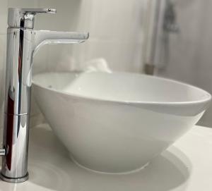 a bathroom sink with a faucet on a counter at ESTÚDIO 81 junto à Sinagoga in Tomar