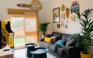 A seating area at Apartamento con jacuzzi y terraza con opcion a Piscina Privada