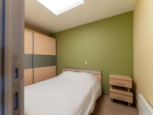 En eller flere senge i et værelse på Bright Coastal Stay in Bredene