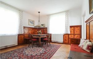 a dining room with a table and chairs at Gstehaus Lohmann in Weissenkirchen in der Wachau