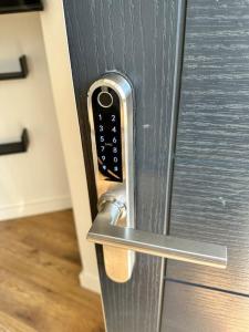 a close up of a door with a remote control at The Modern Smart Home in Great Warley Street