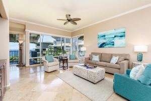 a living room with a couch and chairs at Kapalua Bay Villa 29B4 villa in Kahana