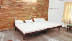 Postel nebo postele na pokoji v ubytování PPG HOMES + 25 fotografií