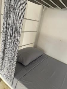 Postel nebo postele na pokoji v ubytování Vive Alegria Hostel