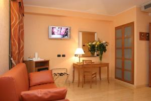 TV a/nebo společenská místnost v ubytování Hotel Continental