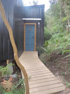 Κήπος έξω από το Cabañas Loft Alto Arrayan Cochamó