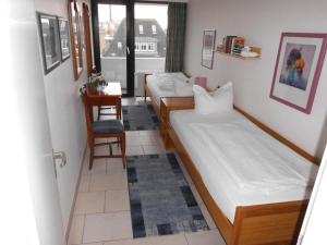 Postel nebo postele na pokoji v ubytování Germania-55 + 8 fotografií
