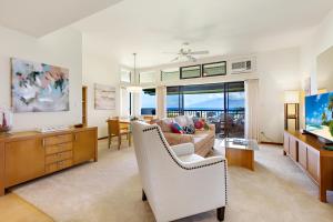 a living room with a couch and a table at Kapalua Ridge Villa 2622 in Kahana
