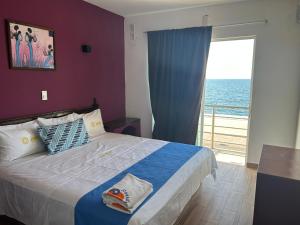 Postel nebo postele na pokoji v ubytování Hotel Jar8 Bule + 33 fotografií