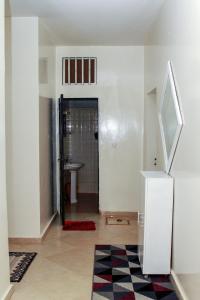 Koupelna v ubytování "Class A", un superbe appartement calme, apaisant et sûr proche des restos et plages de Saly + 48 fotografií