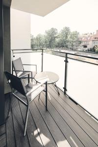 Holiday Siesta Pensjonat, Domki的阳台或露台