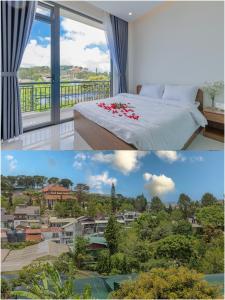 a bedroom with a bed and a view of a city at Happy Home Da Lat in Da Thanh