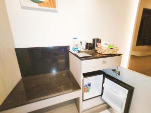 Kuchyň nebo kuchyňský kout v ubytování Mariton Hotel