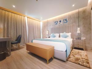 Postel nebo postele na pokoji v ubytování Mariton Hotel