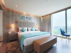 Postel nebo postele na pokoji v ubytování Mariton Hotel