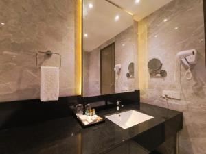 Koupelna v ubytování Mariton Hotel