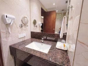 Koupelna v ubytování Mariton Hotel