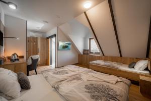 Postel nebo postele na pokoji v ubytování Veldes B&B + 37 fotografií