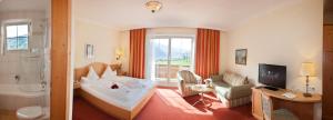 Un pat sau paturi într-o cameră la Hotel Elisabeth