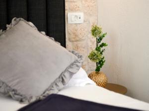 Posteľ alebo postele v izbe v ubytovaní Guesthouse Ana Trogir Old Town