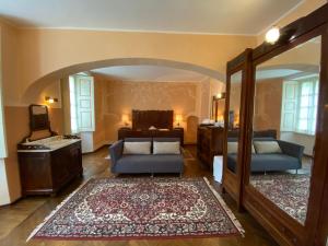Postel nebo postele na pokoji v ubytování Palazzo Ronchelli