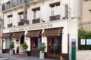 a building with a sign that reads hotel dos and continents at Hotel Des Deux Continents in Paris