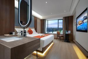Ένα ή περισσότερα κρεβάτια σε δωμάτιο στο Morninginn,Puji +24 φωτογραφίες