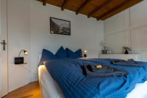 Postel nebo postele na pokoji v ubytování Jungfrau-View Apartment, terrace & free parking