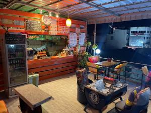 Posezení v ubytování Jenny Hostel HuaHin