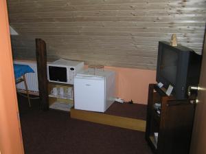 Kuchyňa alebo kuchynka v ubytovaní Apartmán Můza