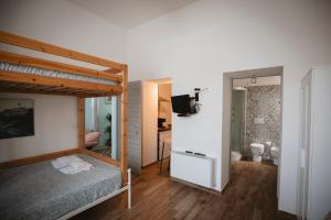 Кровать или кровати в номере Villa Valentina Versilia
