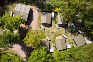 an overhead view of a yard with trees and buildings at Glamping Renswoude in Renswoude
