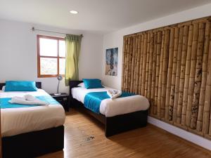 HOTEL PANORAMA SOL客房内的一张或多张床位