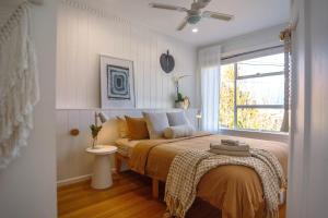 a bedroom with a bed and a window at The Bail - Belmont/ Pet Friendly in Belmont