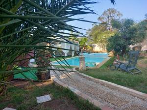 Bazén v ubytování MO-Piscine chauffée, Bénagil-Carvoeiro nebo v jeho okolí