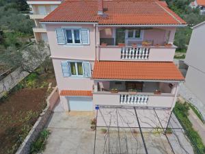 an aerial view of a house with a balcony at Sabina More in Preko