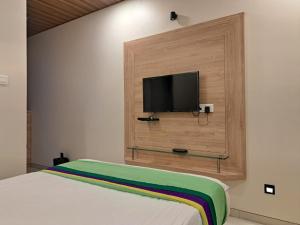 ONELLA REGENCY客房内的一张或多张床位