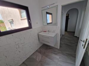 Ванная комната в Leon Apartment